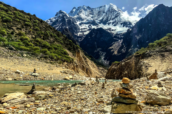 Many little piles of rocks, or chörten, can be seen by the shores of Birendra lake. Constructed by visitors to honour their loved ones. Their shape resembles that of the stupas, so prominent in Buddhist architecture.
 